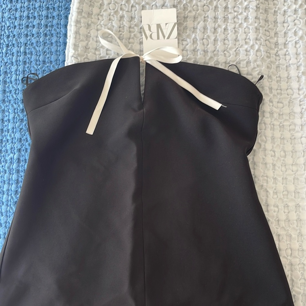 Black Zara mini body con dress, white bow in front